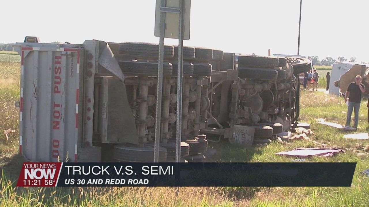 Pickup truck pulling a camper rear-ended by a semi on U.S. 30